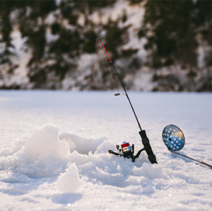 Ice fishing rod and ice scoop. | Justine Russo. 
