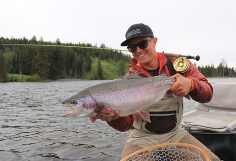 Brennan Lund with Fraser Valley strain rainbow trout. 