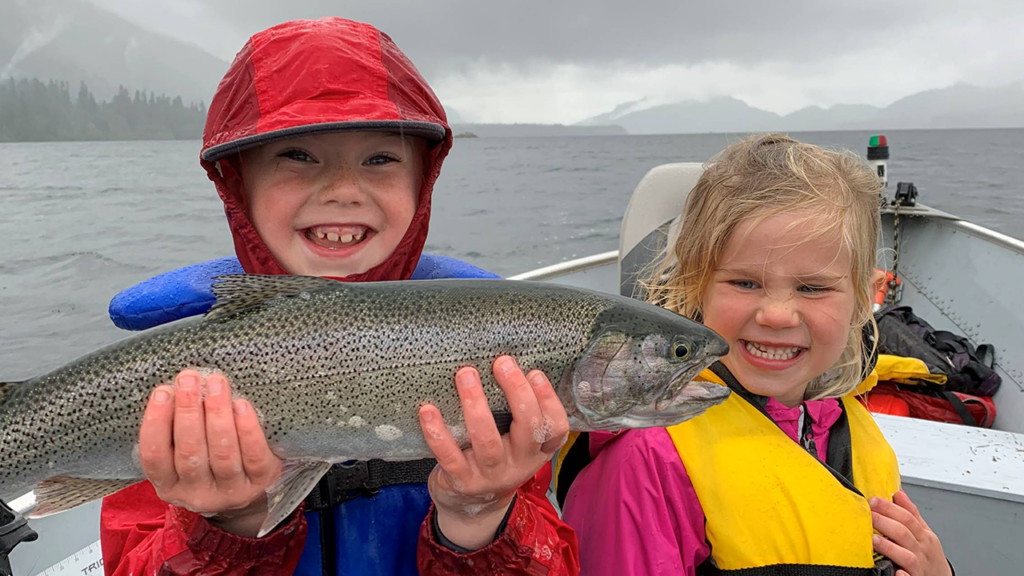 Kids with cutthroat trout. | Craig Schelter.