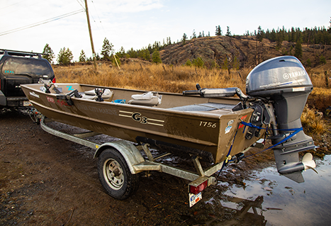 Rod holders on side of boat. Jordan Oelrich.